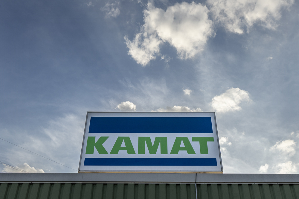 KAMAT logo company nameplate at premises
