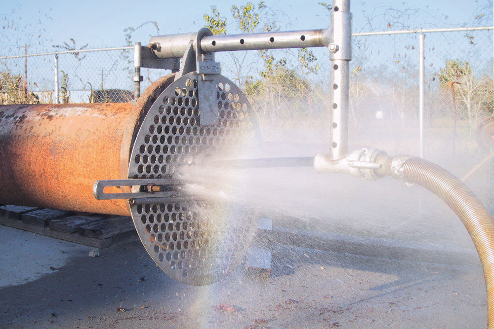 jetting application: a larg pipe being cleaned with high-pressure