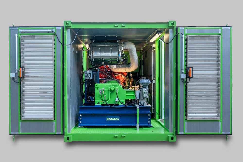 Back view of the green container with the KAMAT High-Pressure Unit K40036a-3G-dw530b