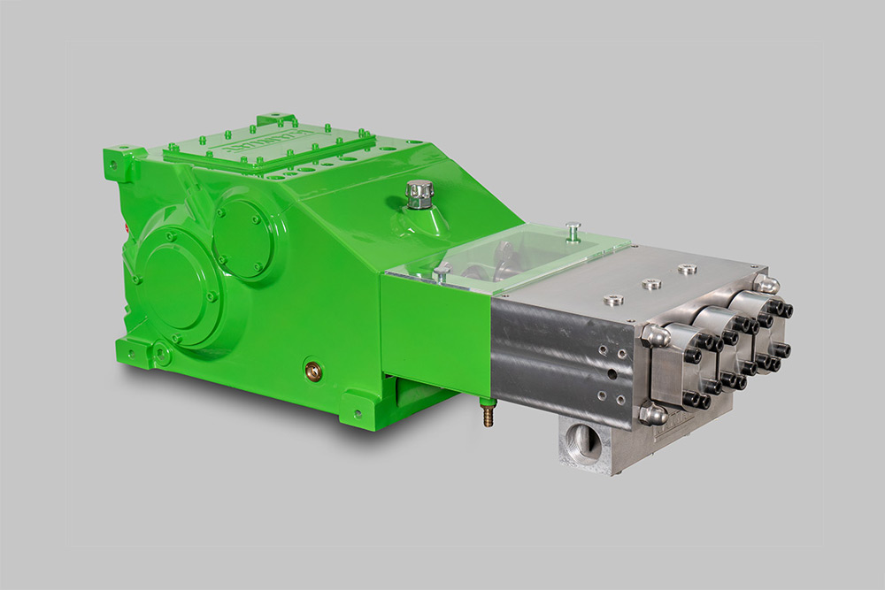 The green KAMAT high-pressure plunger pump K11000-3G